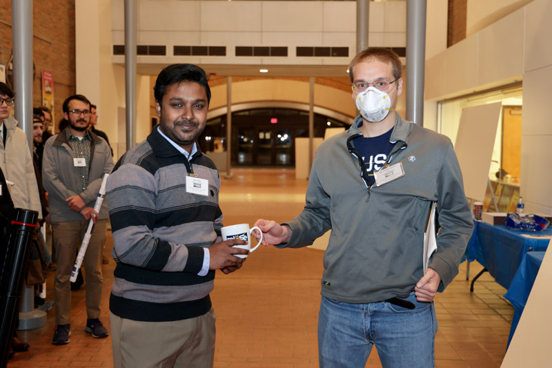 Award winner with a judge