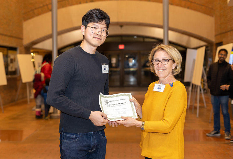 Award winner with a judge