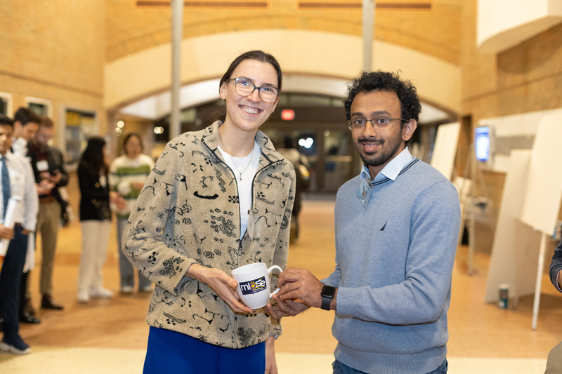 Award winner with a judge